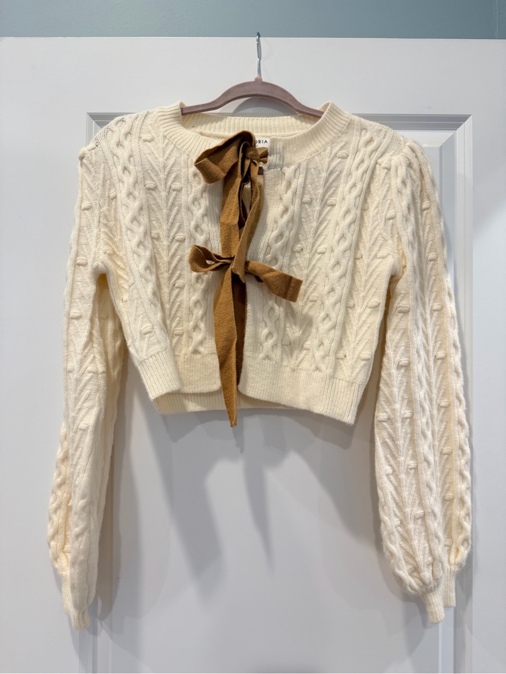 Storia Ivory Cable-Knit Cropped Cardigan with Brown Ribbon Ties